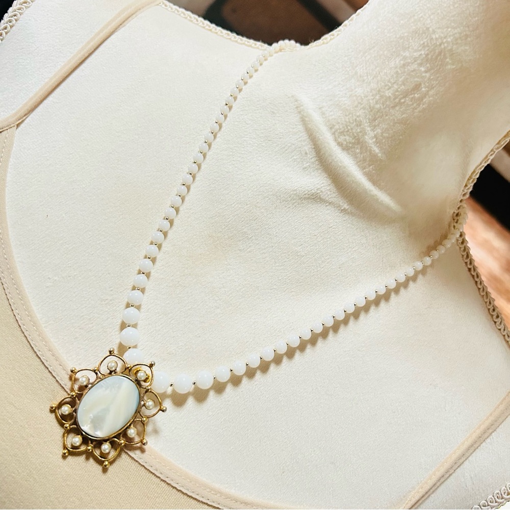 Handcrafted graduated milky quartz mother of pearl pendant necklace